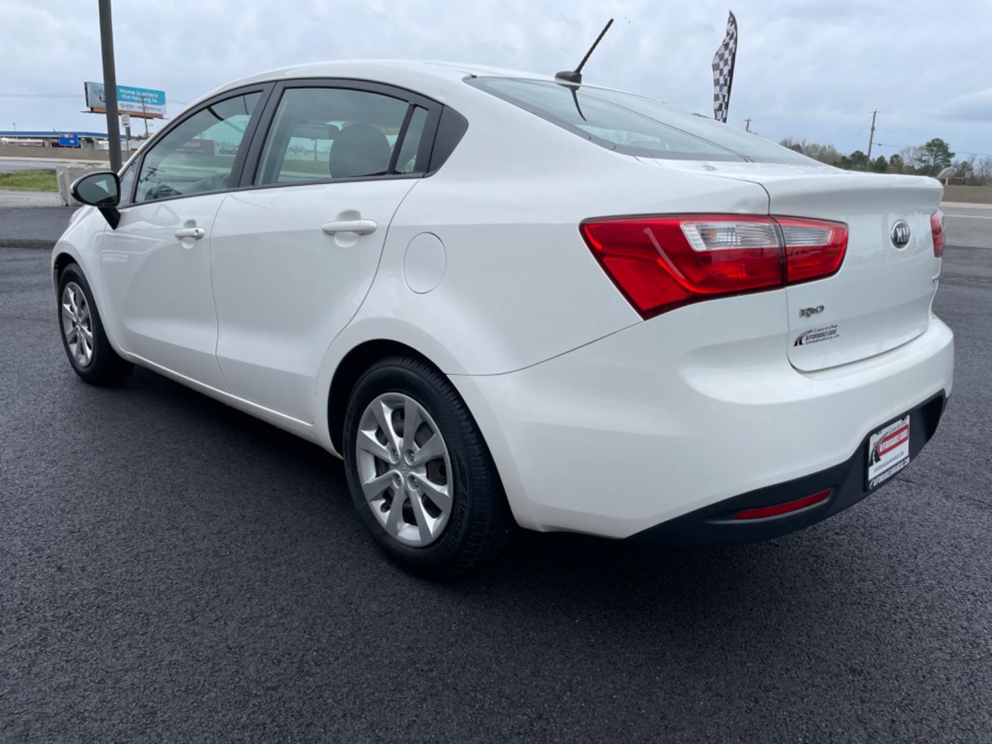 2014 White Kia Rio (KNADN4A35E6) with an 4-Cyl, 1.6 Liter engine, Automatic, 6-Spd transmission, located at 8008 Warden Rd, Sherwood, AR, 72120, (501) 801-6100, 34.830078, -92.186684 - Photo#5